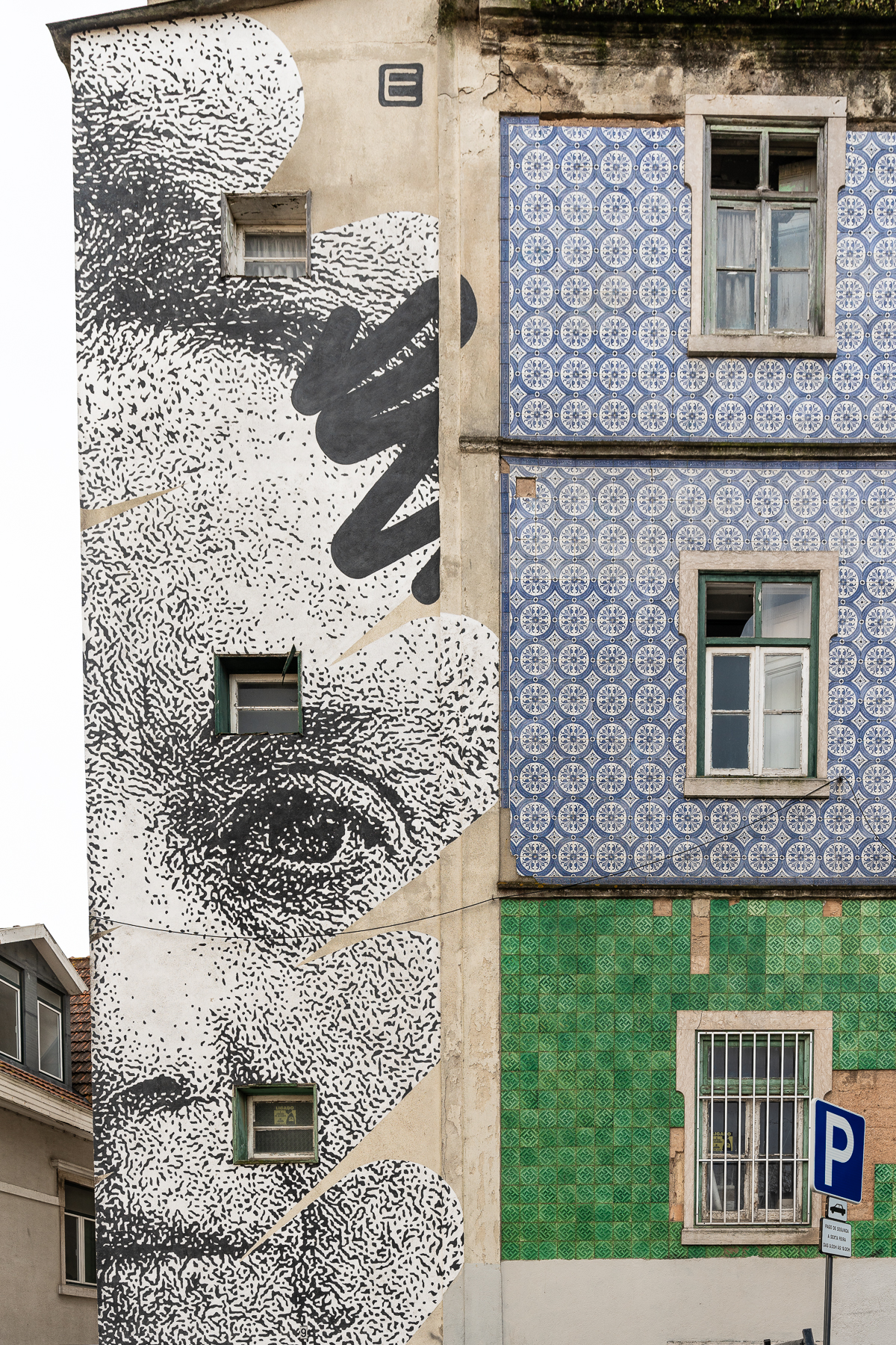 Stencilled black and white mural of the face of Sophia