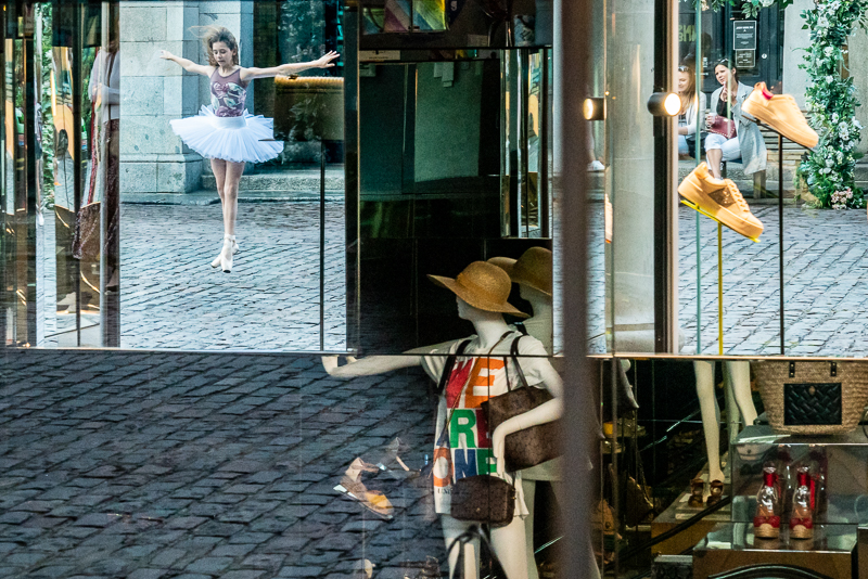 A your ballet dancer reflected in a shop window