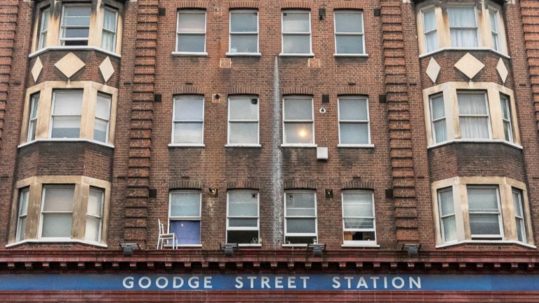A seat balanced outside a window above Goodge Street Station