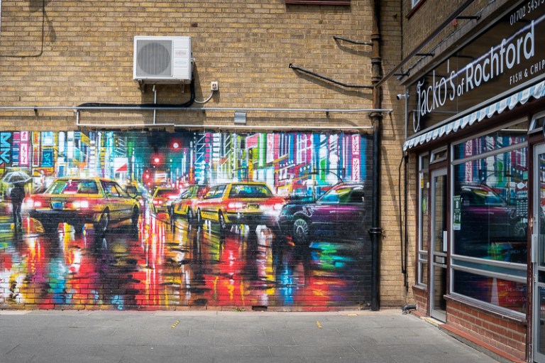 Night street scene mural on brick wall in Rochford