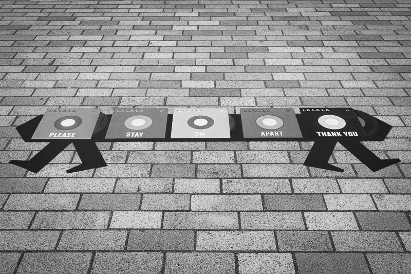 floor sign showing 2 metres