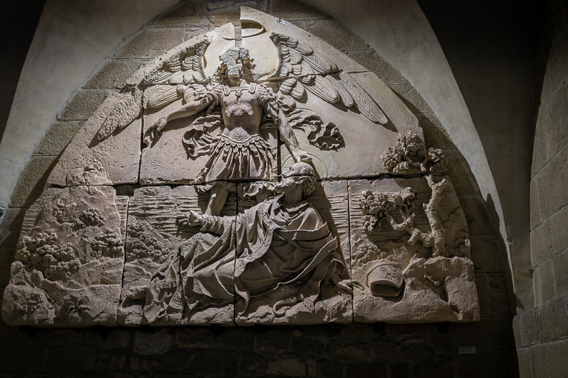Wall carving of Michael appearing to Bishop Aubert