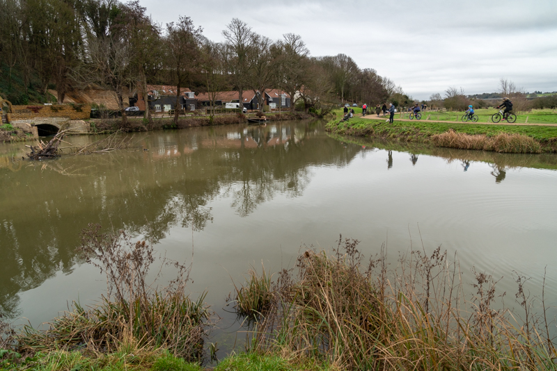 reflections in a cold and muddy river