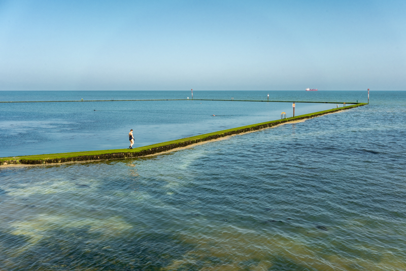 sea, tidal pool fading into sky